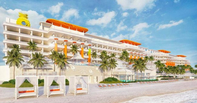 Nickelodeon abre as portas do parque temático do Bob Esponja e outros desenhos Imagem do hotel da Nickelodeon. Ele é branco com detalhes em laranja. Tem vários andares e algumas palmeiras na frente