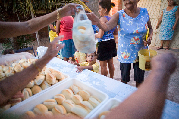 Distribution of soup and bread to poor people. Natal city, PEC Kamikaze