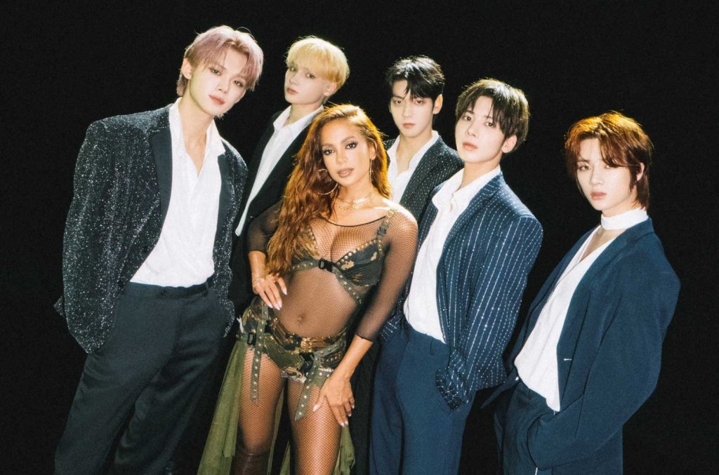 Foto da cantora Anitta junto com o grupo de k-pop TXT