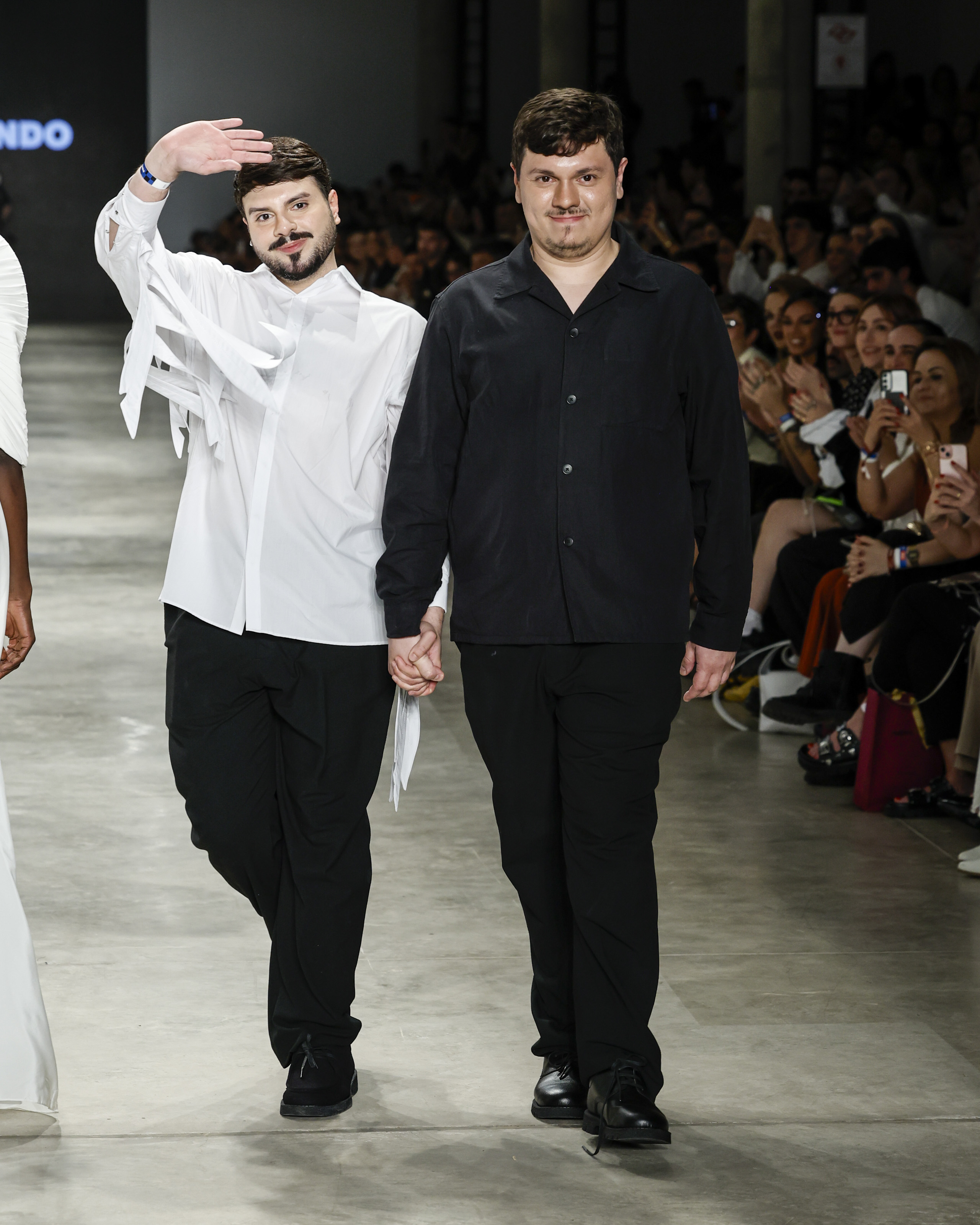 Diretores criativos da marca Normando: Marco Normando e Emídio Contente