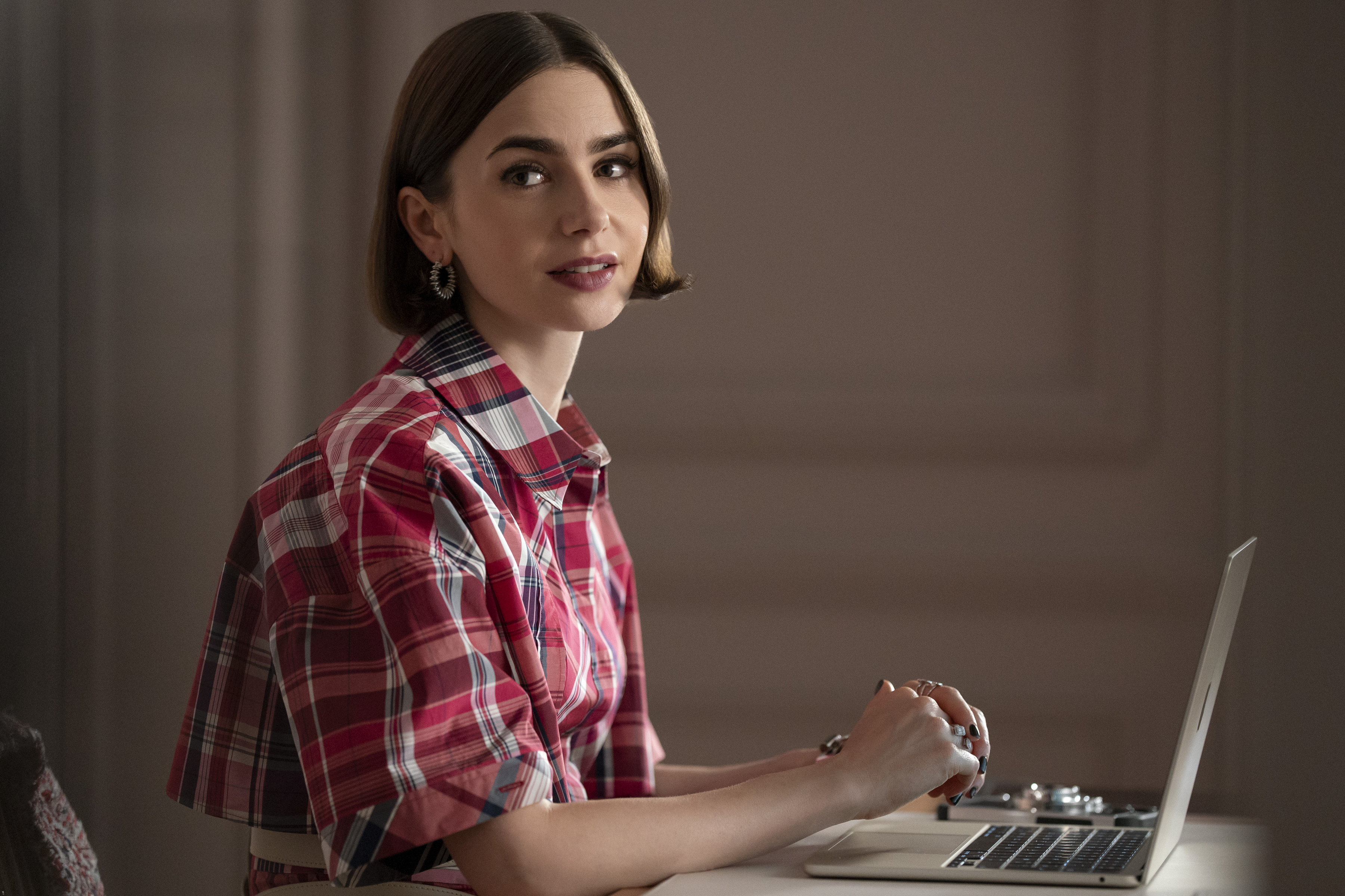 Emily In Paris. Lily Collins as Emily in episode 506 of Emily In Paris. Cr. Caroline Dubois/Netflix © 2025